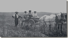 Dr. Jones and three women viewing a cornfield. Photo Source: Denver Public Library
